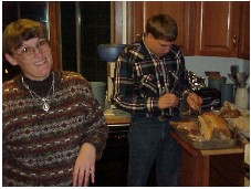 Brandon and Cori carve the turkey